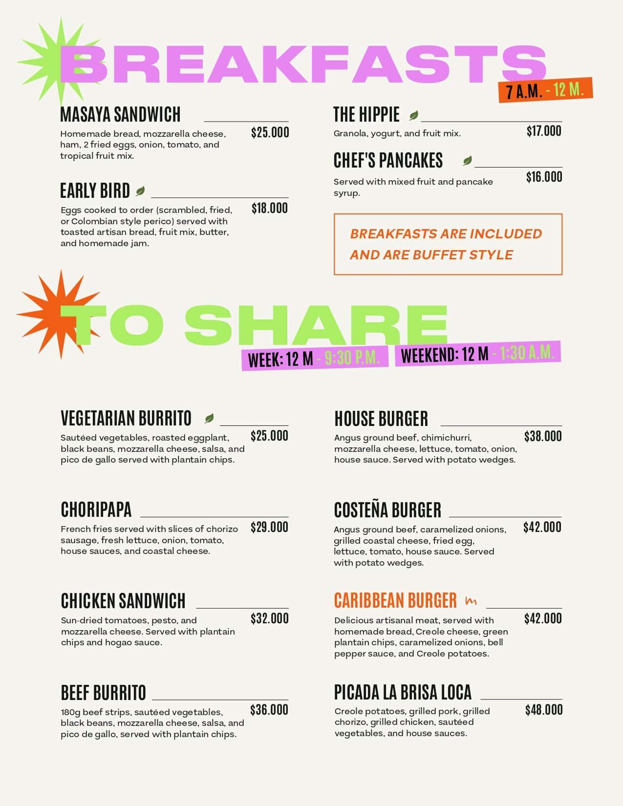 Una variedad de opciones de desayuno estilo buffet y a la carta, incluyendo sandwiches, pancakes y opciones vegetarianas, en un ambiente acogedor y moderno.